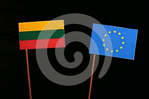 Lithuanian flag with European Union EU flag isolated on black