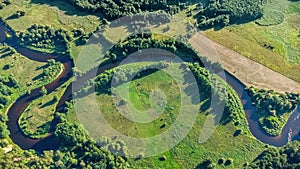 Lithuanian river Merkys and its loop. View from above. Merkys loop exposure. Omega symbol.