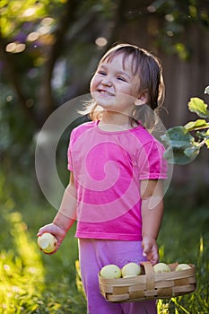 Litle girl with apples