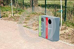 recycling garbage bins in the park along the walkway