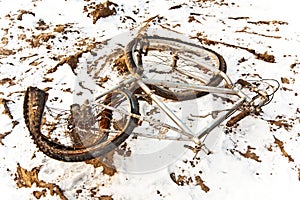 Littered and rusty bicycle