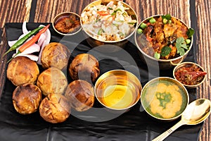 Litti Chokha Or Liti Choka Stuffed With Chana Sattu And Drenched In Desi Ghee Is Regional Food Of Bihar Jharkhand And Uttar