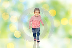 Little african american baby girl walking