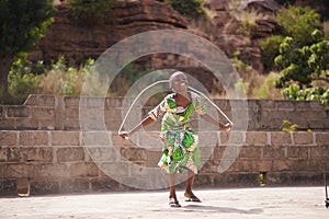 Little African Girl Enjoying Herself With Her Skipping Rope