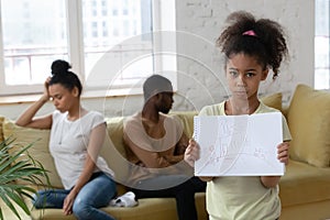 Little african girl sufferring from parents conflict or divorce