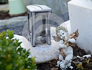 Little angel on grave