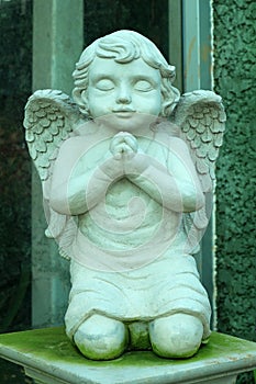 Little Angel Statue Decorated in the Garden