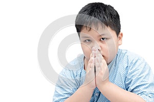 Little asian boy spiritual peaceful praying isolated
