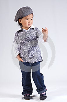 Little asian girl with a hat