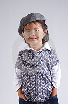 Little asian girl with a hat