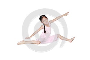 Little asian girl in pink leotard practise her ballet dance isolated on white background. Children is studying ballet