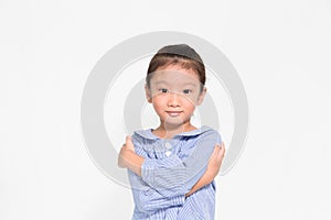 Little asian girl posing proudly on isolated background