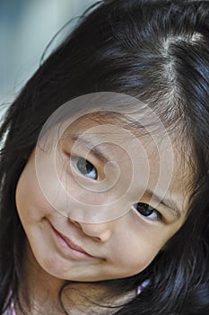 Little Asian girl smile.
