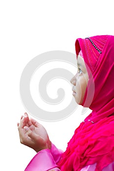 Little Asian Muslim kid girl in pink hijab Muslim scraft prayi