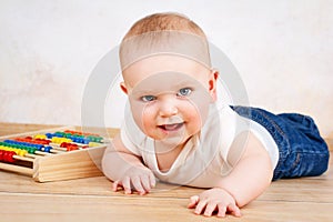 Little baby boy crawling on the floor