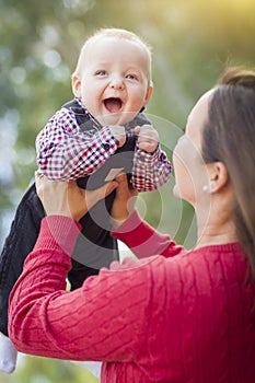 Little Baby Boy Having Fun With Mommy Outdoors