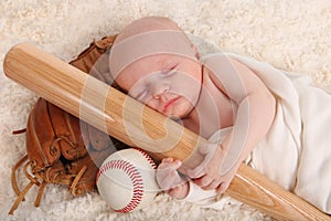 Little Baby Boy Holding a Baseball Bat