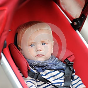 Little baby boy in stroller