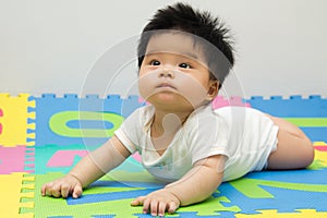 Little baby crawling on floor