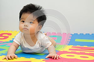 Little baby crawling on floor