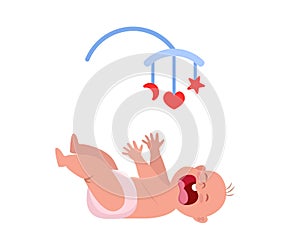 Little baby crying hesterically. Crying baby lies and pulls up the handles. Little kid being unhappy. Baby bed carousel toy above