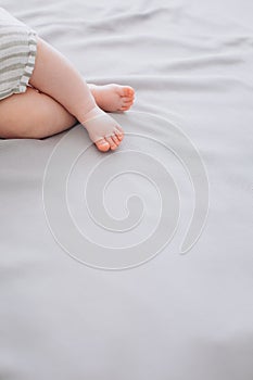 little baby feet bed delicate textile conceptual