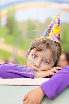 Little baby girl Celebrating her birthday. Hat and festive mood