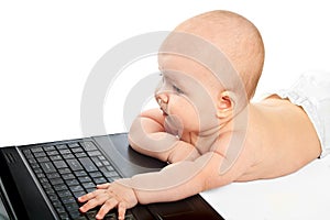 Little baby with laptop.