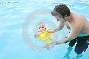 Little baby's first swim