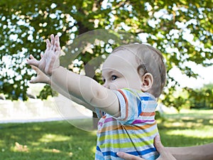 Little baby tent hands up.