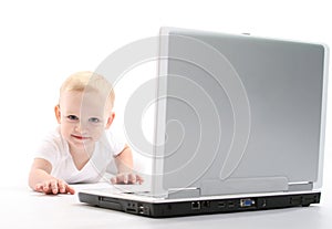 Little baby using laptop