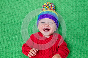 Little baby in warm knitted hat