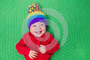 Little baby in warm knitted hat