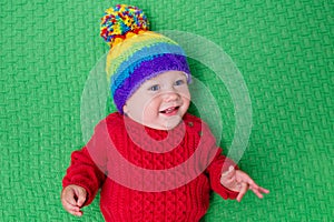 Little baby in warm knitted hat