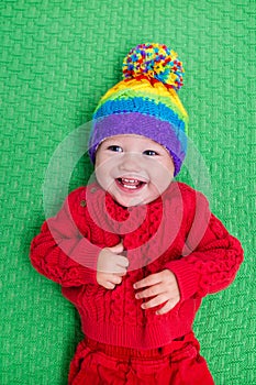 Little baby in warm knitted hat