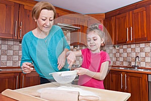 Little baker and her mom