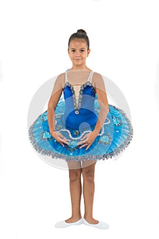 Little ballerina girl in blue tutu. Adorable child in classical ballet position. Little child dance, physical