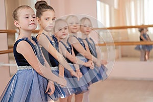 Little ballerinas perform at a dance school.