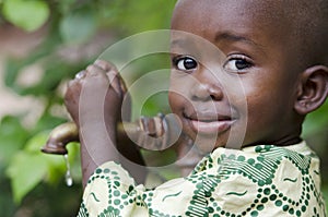 Little black boy asking begging for clean water. Its scarcity af