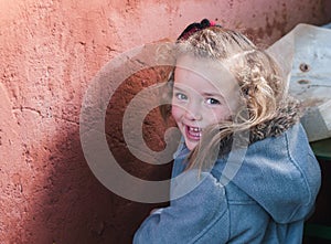 Little blonde girl smiling