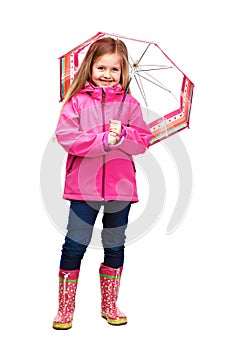 Little blonde hair girl standing against white background with