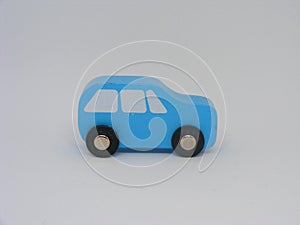 A little blue toy wooden car isolated