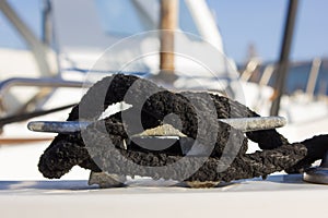 Little boat bollard with black marine cord node