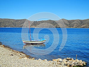 Little boat at Titicaca Lake. Bolivia photo