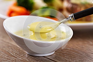 Little Bowl of Bearnaise Sauce. High quality photo. photo