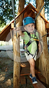 Little boy in adventure park