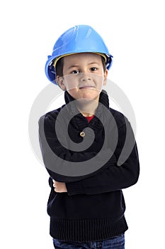 Little boy, arms crossed, with protection helmet