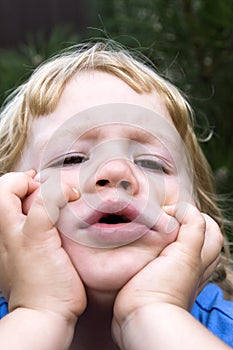 Little boy as a big thinker photo