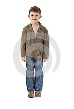 Little boy in autumn clothes smiling