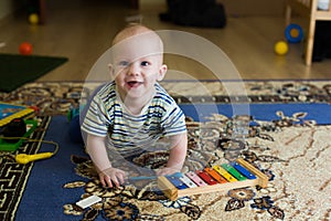 Little boy, baby, xylophone musical instrument